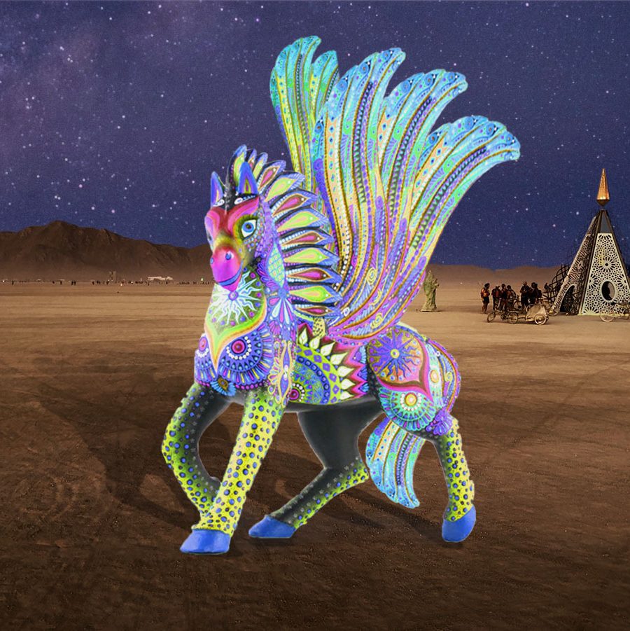 a 10' tall alebrije pegasus statue glowing at night.